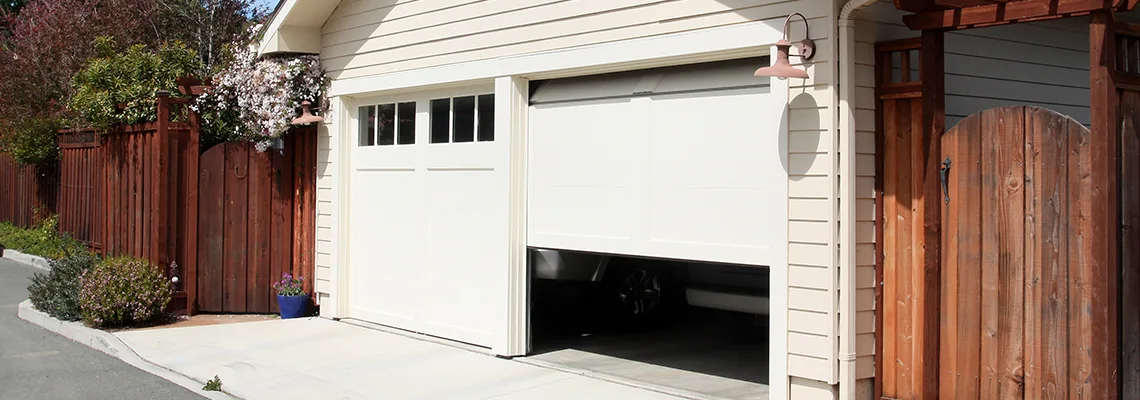 Fix Metal Garage Door Jerking in Carpentersville, Illinois